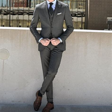 charcoal grey suit brown shoes.